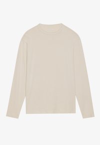 Beige long-sleeve t-shirt made of soft fabric, featuring a round neckline and relaxed fit with minimal seams for a clean look.