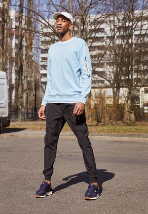 JOGGER - Cargo trousers - black