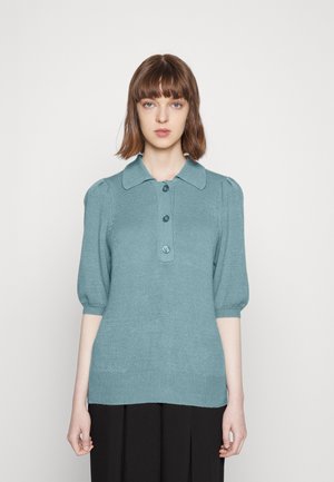 Light teal short-sleeve knit sweater with a collared neckline, buttoned placket, and ribbed hem. Smooth texture with slight puff sleeve detail.