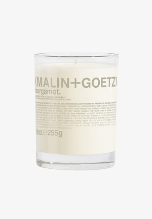 Weiße Glaskerze mit einem natürlichen Baumwolldocht, etikettiert mit hellgrauem Text, mit einem ausgeprägten Bergamott-Duft. 9 Unzen (255 g) Fassungsvermögen.