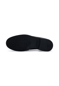 Black rubber shoe sole with a textured surface featuring oval patterns and a logo. Sleek, rounded design with a flat profile.