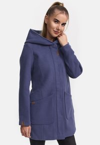 Purple hooded coat made of soft fabric. Features large front pockets and brown leather accents. Smooth texture with a straight design.