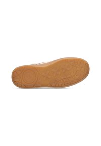 La semelle de la chaussure présente une surface en caoutchouc texturée de couleur gomme. Le motif comprend des formes circulaires et croisées pour une adhérence et une traction optimales.
