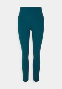 Teal höga leggings tillverkade av elastiskt, mjukt material. Har en figurnära design med sömlös konstruktion för komfort.