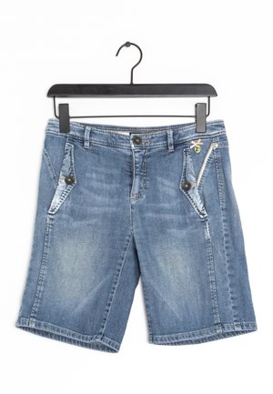 Blue denim shorts with front button and zipper, two side pockets with button flaps, hanging on a black plastic hanger.