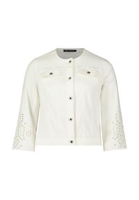 Biała denimowa kurtka z okrągłym dekoltem, z przodu na guziki, z dwoma kieszeniami na piersi i haftem w oczka na rękawach.