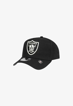Black cap made of fabric featuring an embroidered Raiders logo on the front. Curved visor and adjustable strapback design.