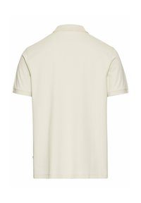 Kortærmet, cremefarvet polo skjorte med ribbet krave og et rent design. Glat tekstur, minimal detaljer, ingen synlige logoer eller mønstre.