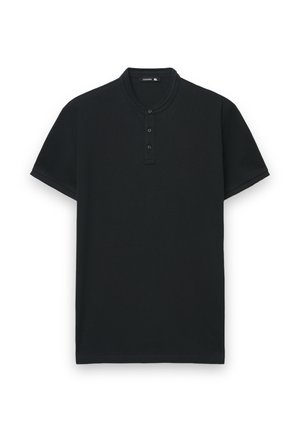 T-shirt henley nera in misto cotone con maniche corte, abbottonatura a tre bottoni e collo arrotondato. Tessuto liscio e design minimalista.