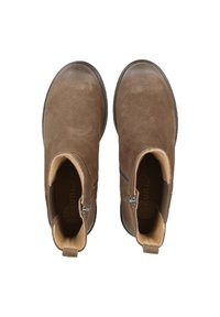 Bottines en daim marron avec un bout rond, fermeture éclair sur le côté et un doublure intérieure contrastante. La semelle est plate et en caoutchouc.