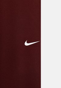 Nike Performance UNISEX - Leggingek - Nadrágok - dark team red/picante red/white
