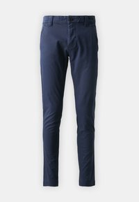 Slim-fit marinblå herrbyxor med bältesringar, framknapp och fickor, uppvisade mot en vit bakgrund.