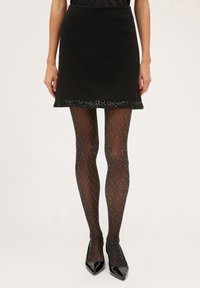 Motivi CORTA CON BORDO IN PAILLETTES - Gonna a campana - nero