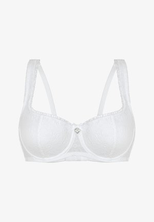 Weißer Spitzen-BH mit floralem Muster, Unterstüzung durch Bügel, dezente Rüschchen an den Trägern und einem kleinen herzförmigen Anhänger in der Mitte.