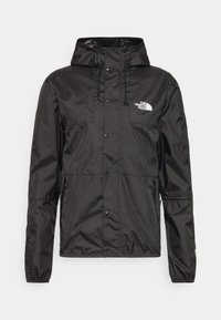 Veste imperméable noire à capuche avec boutons-pression sur le devant, cordons, poches latérales et logo The North Face sur la poitrine.
