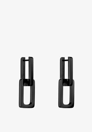 Boucles d'oreilles noires présentant un design géométrique et rectangulaire avec une finition brillante. Le matériau semble être du métal avec une texture lisse.