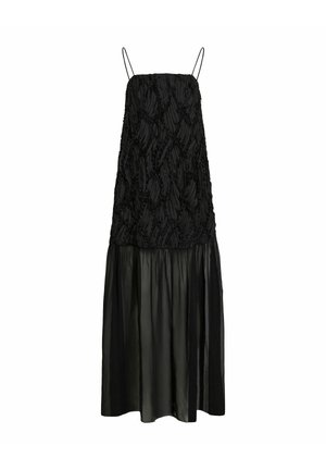 Robe noire à fines bretelles, dotée d'un corsage texturé et d'une jupe en satin fluide. Le tissu présente un design à volants et superposé pour plus de détails.