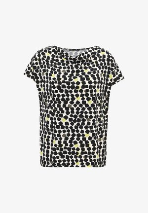 Haut à manches courtes en tissu léger présentant un motif abstrait noir et blanc avec des accents jaunes et verts. Encolure ronde, coupe décontractée.