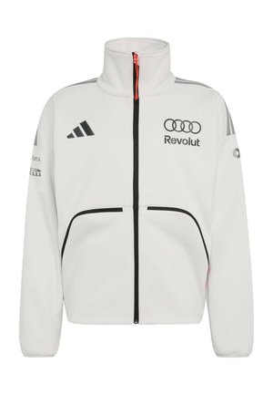 White zip-up jacket with high collar, black zipper and pockets, Adidas and Audi Revolut logos, and gray shoulder stripes.