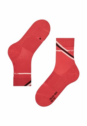 Rote Socken mit strukturiertem Design, ausgestattet mit weißen und schwarzen diagonalen Streifen. Mit Größe und Branding auf der Sohle gekennzeichnet.
