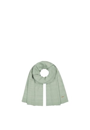 Soft light green knitted scarf folded with a round loop at the top and loose ends hanging down.