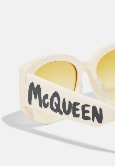 Alexander McQueen Sluneční brýle - white/yellow