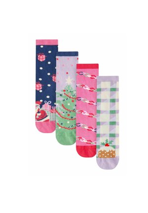 Four pairs of cotton socks featuring Christmas designs: gifts, a tree, candy canes, and a gingerbread pattern, with varied colors and textures.