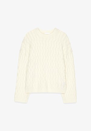 Kootud sviiter heleses värvitoonis; omab ümmargust kaelust ning soonikuid varruka- ja servaosas. Pehme, tekstuuriga materjal mustrilise pinnaga.