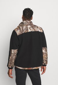 The North Face Kurtka z polaru