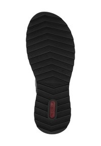 Semelle de chaussure en caoutchouc noir avec un motif de semelle en zigzag et un marquage rouge. Présente une texture lisse et des bords arrondis pour plus de stabilité.