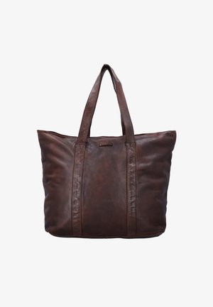 Grand sac fourre-tout en cuir marron foncé avec deux longues poignées, couture visible, et légère texture naturelle sur un fond blanc.