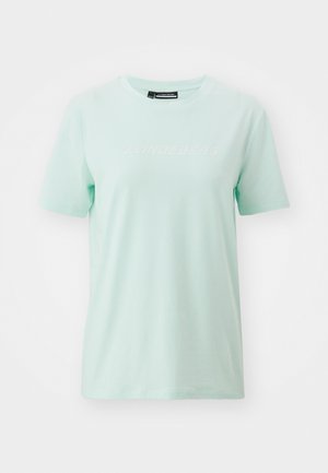 Licht mintgroene katoenen T-shirt met een ronde hals en korte mouwen. Heeft een subtiele witte logo-tekst "J.LINDEBERG" over de borst.