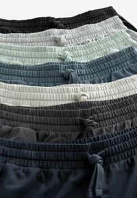 Övszínek gyűjteménye: fekete, szürke, menta, világosszürke, zöld, sötétzöld és tengerészkék. Mindegyik elasztikus és zsinóros részletekkel rendelkezik.