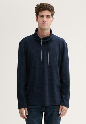 Marineblauw sweatshirt met lange mouwen, gemaakt van gestructureerde stof, met een hoge nek en koordjes. Het heeft een relaxte pasvorm en verlaagde schouders.