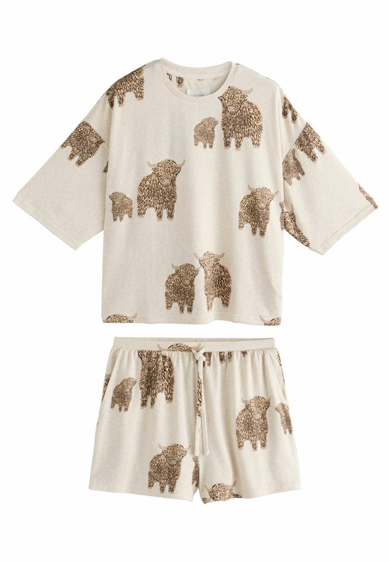Beige loungewearset bestaande uit een kortemouwtop en shorts. Beide zijn bedrukt met bruine harige dierenafbeeldingen. Zacht, relaxte pasvorm.