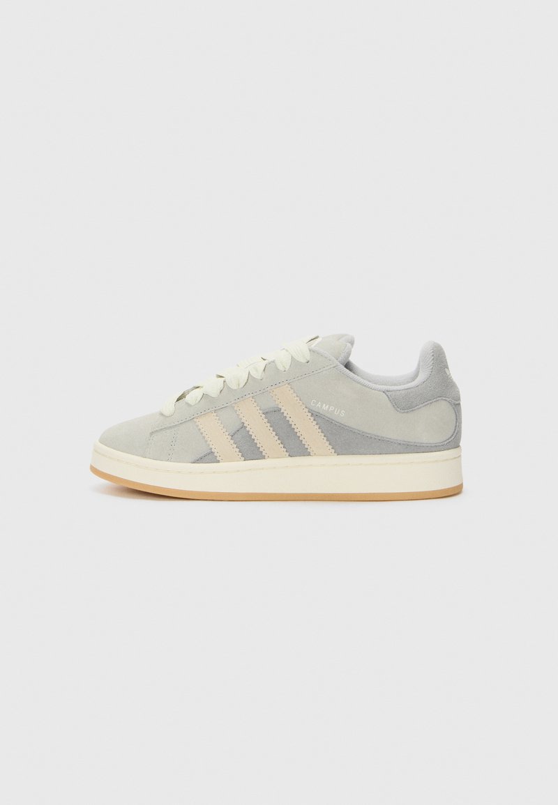 Gray suede sneaker with three light beige stripes, cream laces, padded collar, and a rubber gum sole. "CAMPUS" logo on the side.