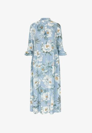 Šviesiai mėlyna midi ilgio suknelė su baltais ir žalsvai mėlynais gėlių raštais, su trim ketvirtadaliais rankovių, sagomis ir švelniu raukšlėjimu rankogaliais.