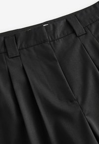 Next Nohavice - black