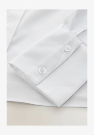 Witte overhemdmanchet met twee witte knopen, gladde katoenstof en een schone, op maat gemaakte uitstraling zonder zichtbare patronen.