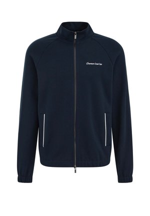 Veste zippée bleu marine à col montant, poignets élastiques, deux poches avant avec bordure blanche et logo "Downtown Social Club" sur la poitrine.