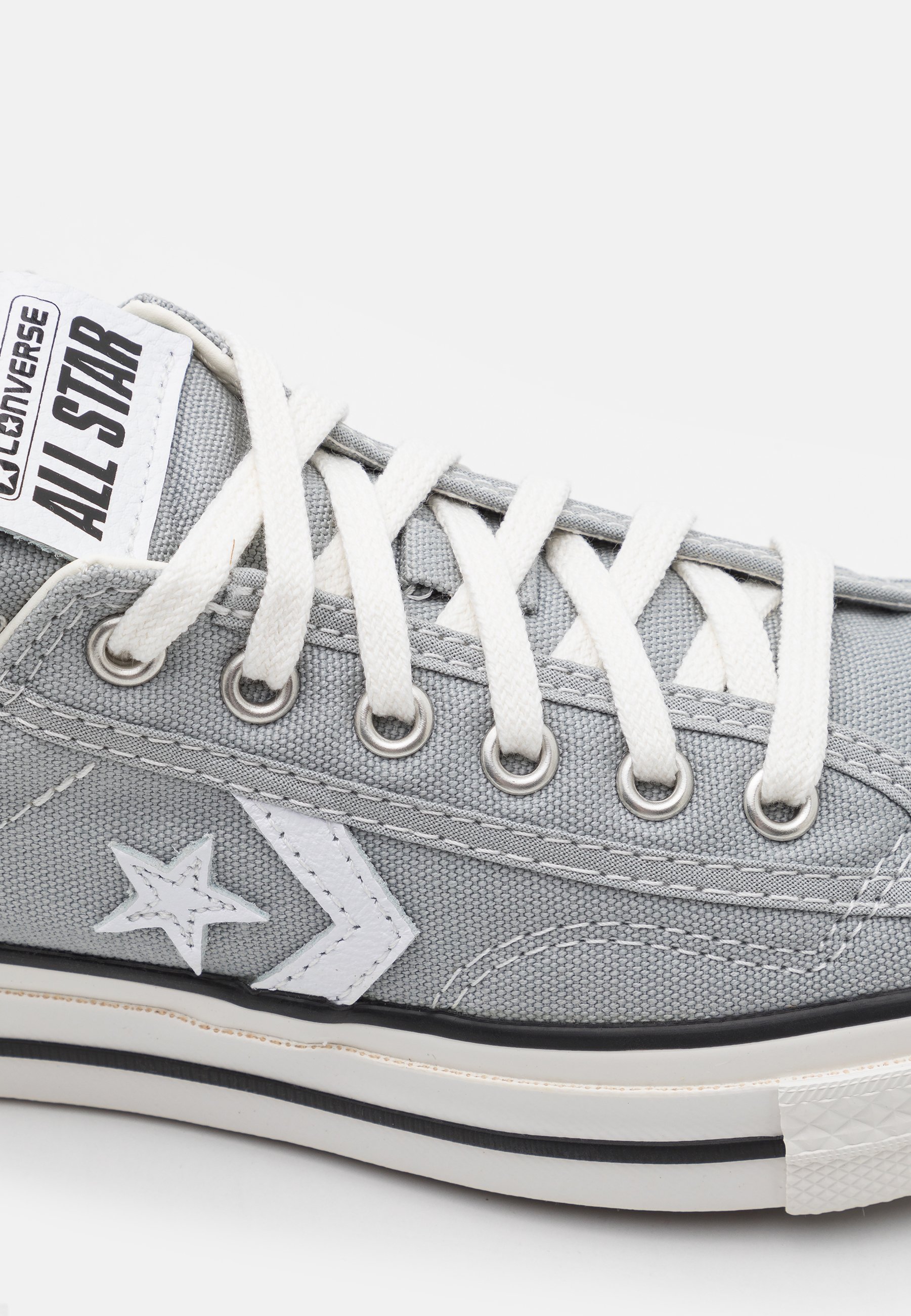 converse grey star player