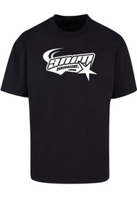 Svart bomulls T-skjorte med korte ermer, med et stort hvitt grafisk logo og stjernesdesign på forsiden. Rund hals, avslappet passform.