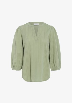 Svijetlozelena bluzica s opuštenim krojem, vertikalnim prugama, V-izrezom i napuhanim rukavima s elastičnim manžetama. Mekana, teksturirana tkanina.
