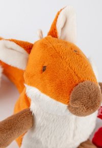 Orange and white plush fox toy with large ears, brown nose, and limbs, against a plain white background.