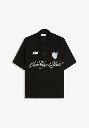 Black short-sleeve polo shirt with three buttons, white crest on chest, moon phases symbol, and "Nothing Lasts" cursive text across front.