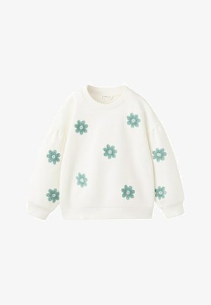 Sweat-shirt blanc à manches longues avec col rond, décoré de huit fleurs vertes brodées réparties sur le devant et les manches.