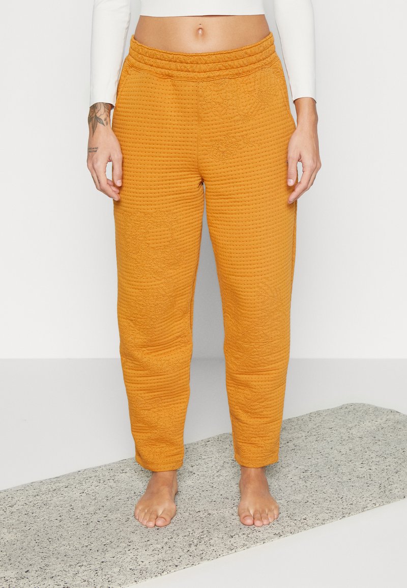 Nike Performance LUXE BOTTOM Tracksuit bottoms desert ochre/earth