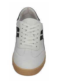 White leather sneaker with black accents, featuring a rounded toe, flat laces, and a light brown rubber sole. Smooth texture with minimal detailing.