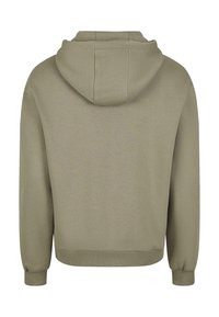 Felpa con cappuccio verde kaki, maniche lunghe, polsini e orlo a costine. Tessuto liscio con una vestibilità rilassata e un dettaglio di cucitura sul cappuccio.