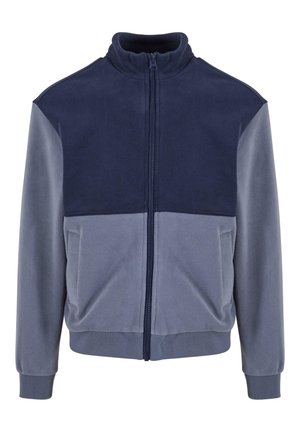 Fleece-Shirts mit Reißverschluss in Marineblau und Hellgrau, mit hohem Kragen, durchgehendem Reißverschluss und gerippten Bündchen und Saum. Glatte Textur, lockere Passform.